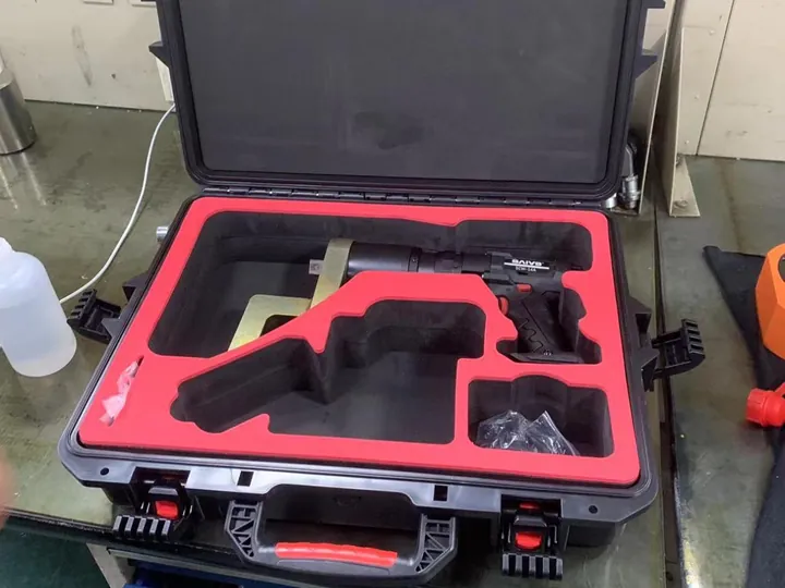 An electric torque wrench in a tool box An electric torque wrench in a tool box